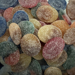 Close-up of colorful gummy candy with a sugary texture.