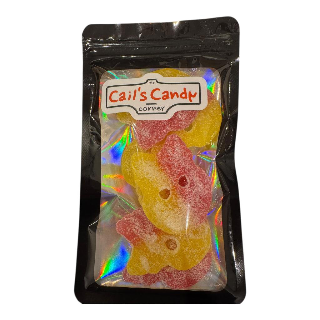 Packaged gummy skulls with 'Cail's Candy Corner' label on a white background