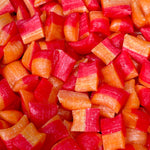 Close-up of red and orange hard candy pieces.